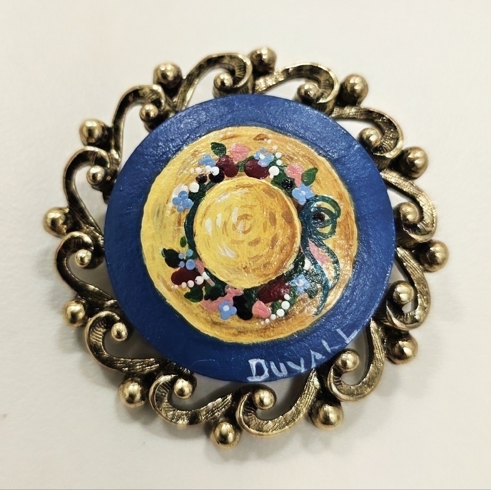 Vintage Dayne Duvall Gold-Tone Metal Hand-Painted Brooch w/ Hat & Floral Design
